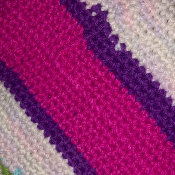 One pair of pink, purple, green, white, and blue striped potholders - Picture 5 of 7
